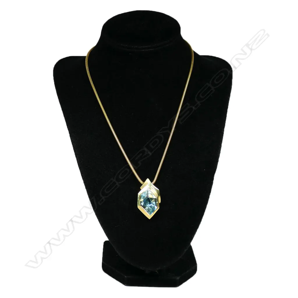A 14ct gold and aquamarine modernist pendant, Image 1++
