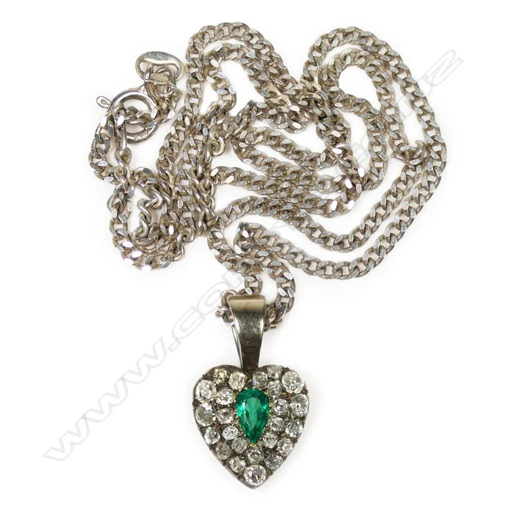 An 18ct white gold emerald and diamond necklace, Image 1++