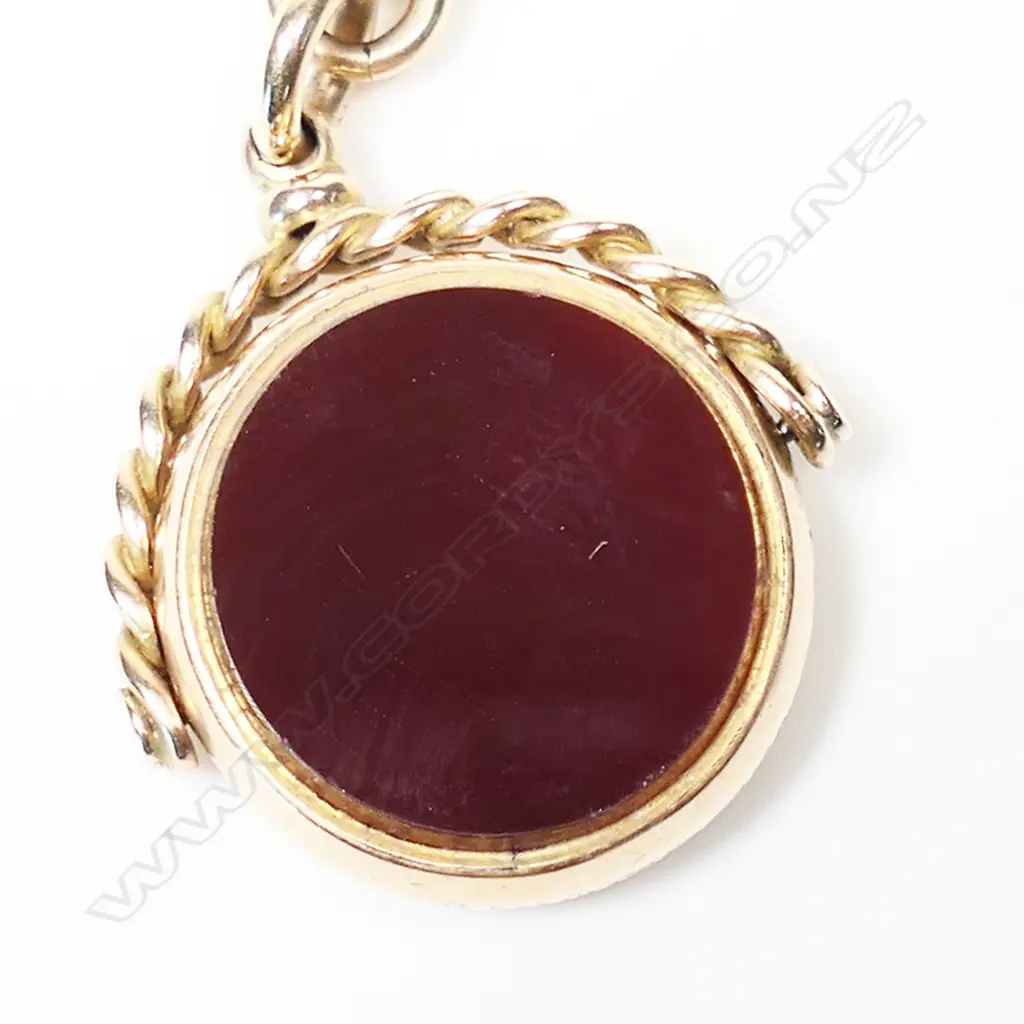 A c.1900 9ct yellow gold Albert chain with 9ct gold fob spinner, Image 1++