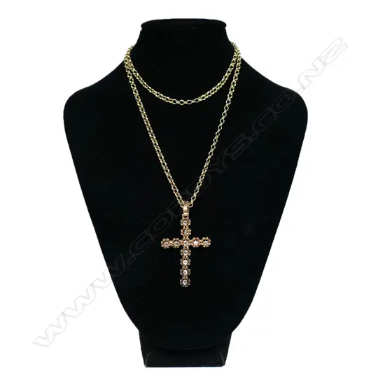 An antique 14ct rose gold and diamond cross,