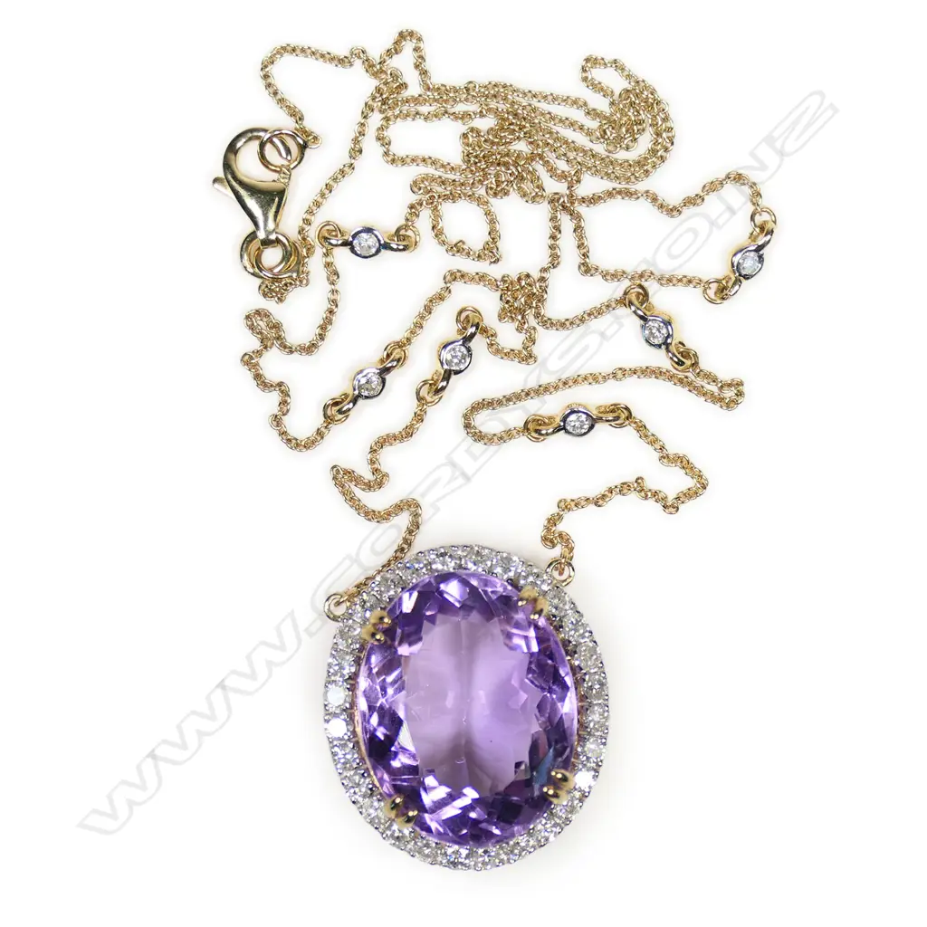 A 10ct gold diamond and amethyst necklace, Image 1++