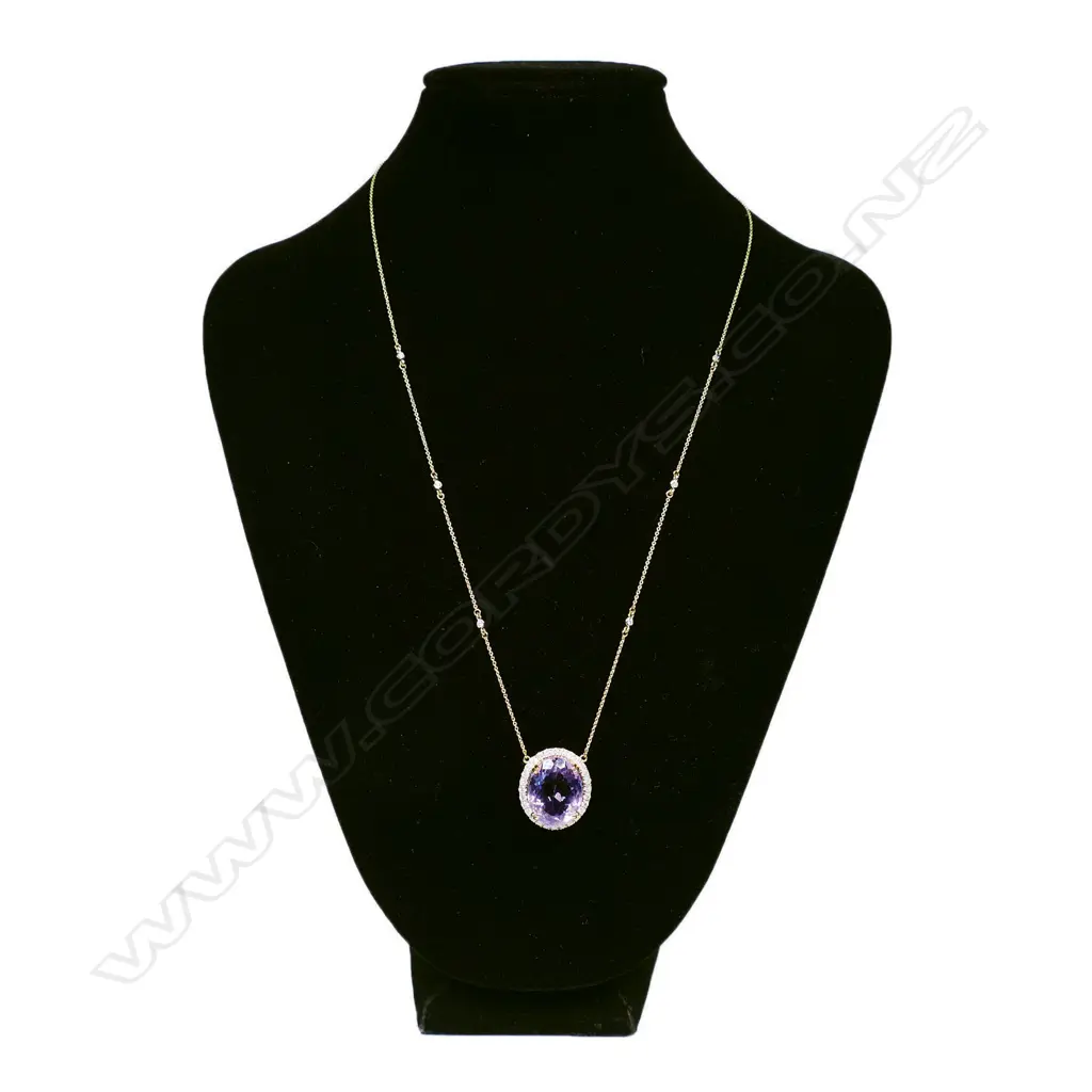 A 10ct gold diamond and amethyst necklace, Image 1++