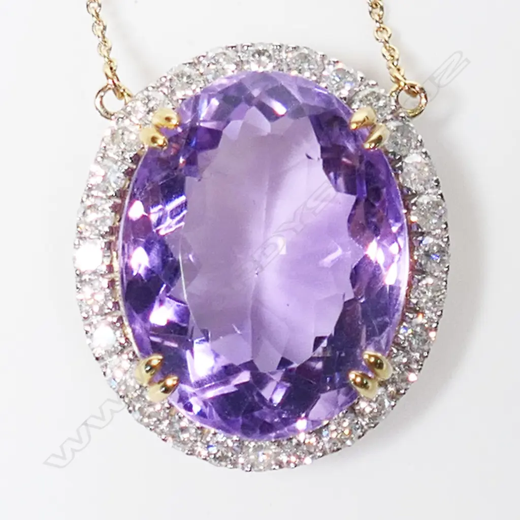 A 10ct gold diamond and amethyst necklace, Image 1++