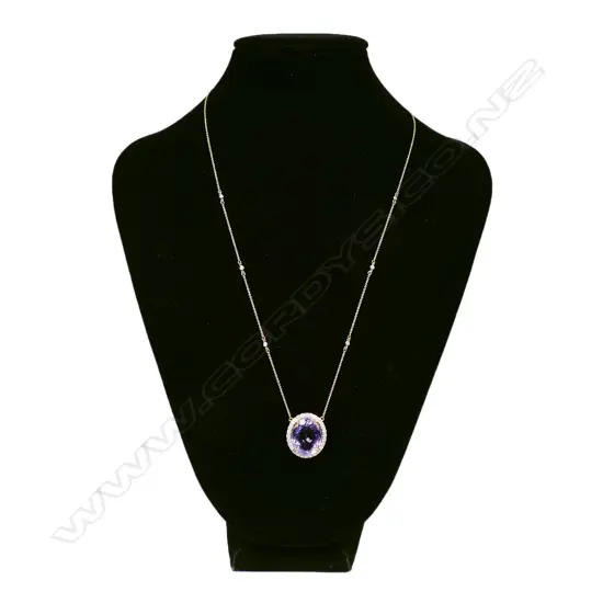 A 10ct gold diamond and amethyst necklace,