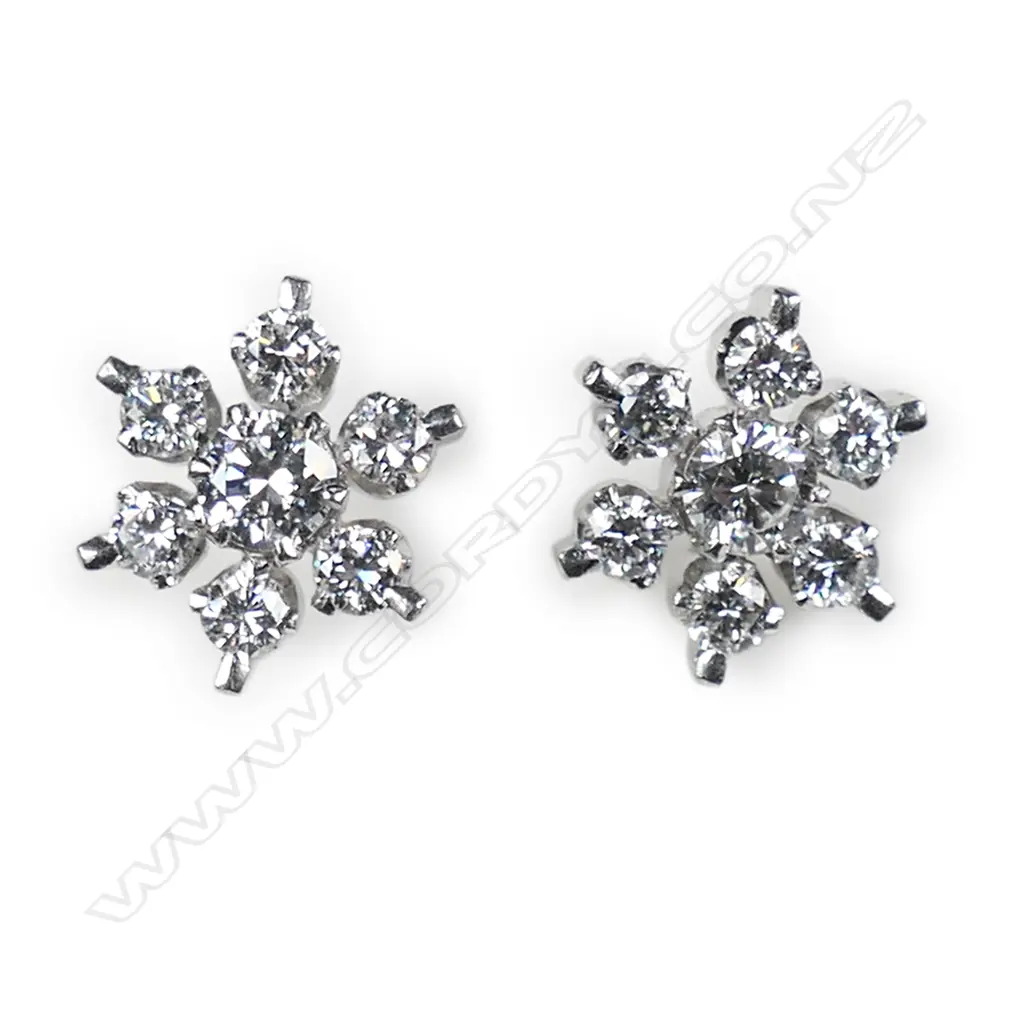 A pair of 18ct white gold and diamond cluster earrings, Image 1++