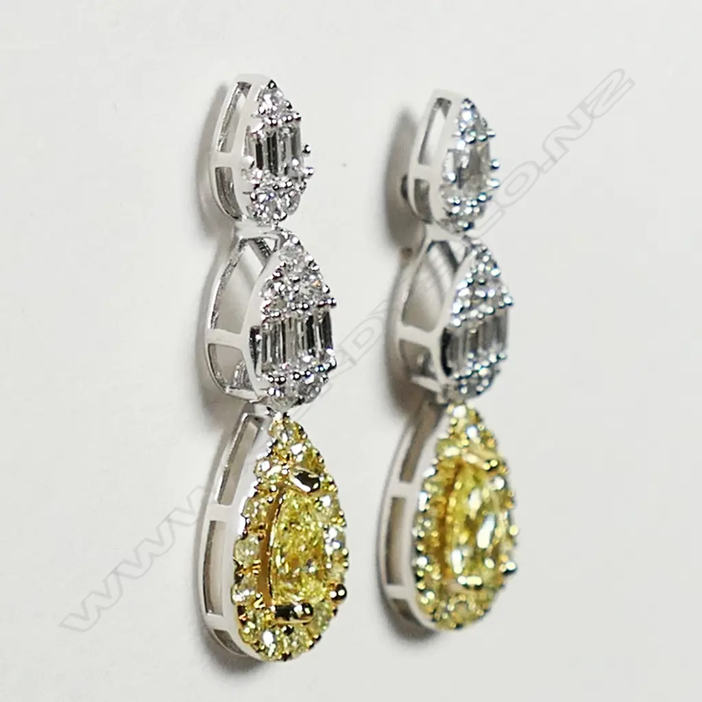 A pair of 18ct white gold and white and yellow diamond cluster drop earrings, Image 1++