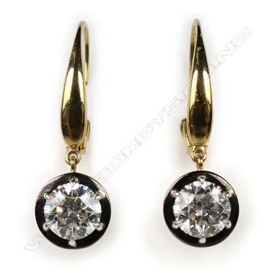A pair of 18ct gold and diamond earrings,