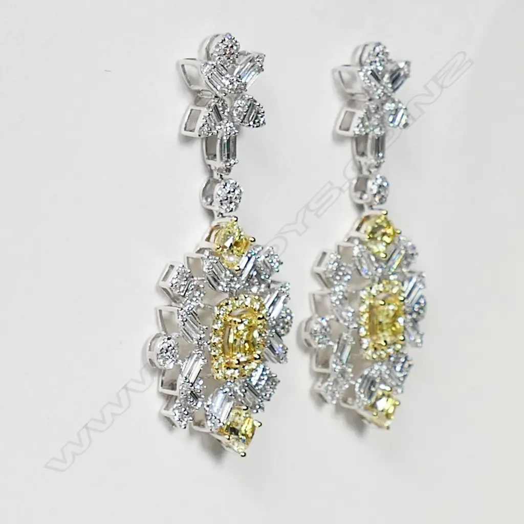 A pair of 18ct white gold and white and yellow diamond cluster drop earrings, Image 1++