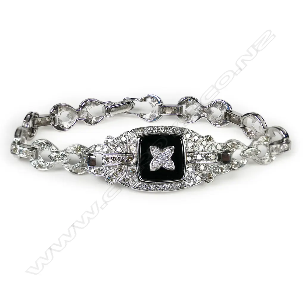 A 14ct white gold diamond and onyx Art Deco style bracelet, Image 1++