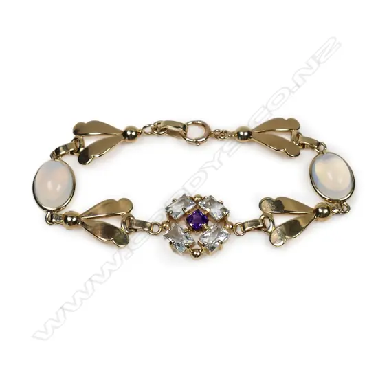 A 14ct gold moonstone, aquamarine and amethyst bracelet,