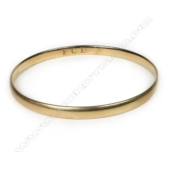 A 9ct gold bangle,