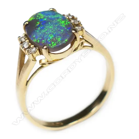 A 14ct gold opal and diamond ring,
