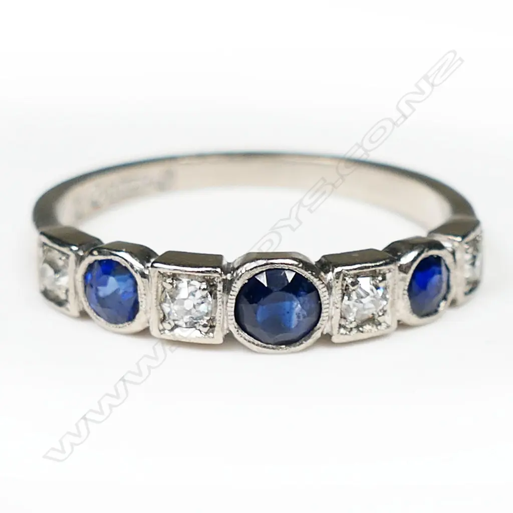 An 18ct white gold sapphire and diamond band, Image 1++