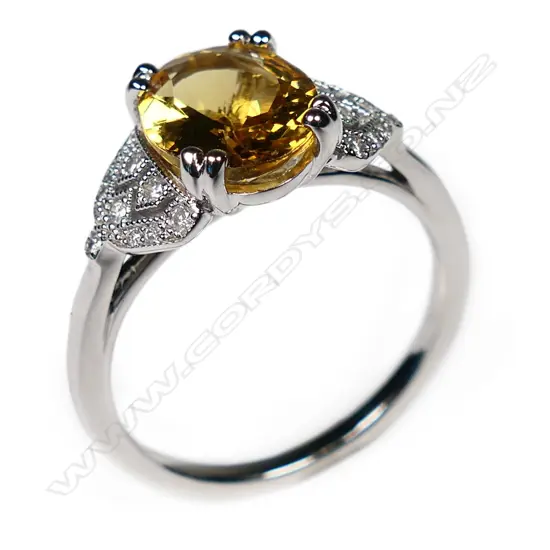 A 14ct white gold heliodor and diamond ring,