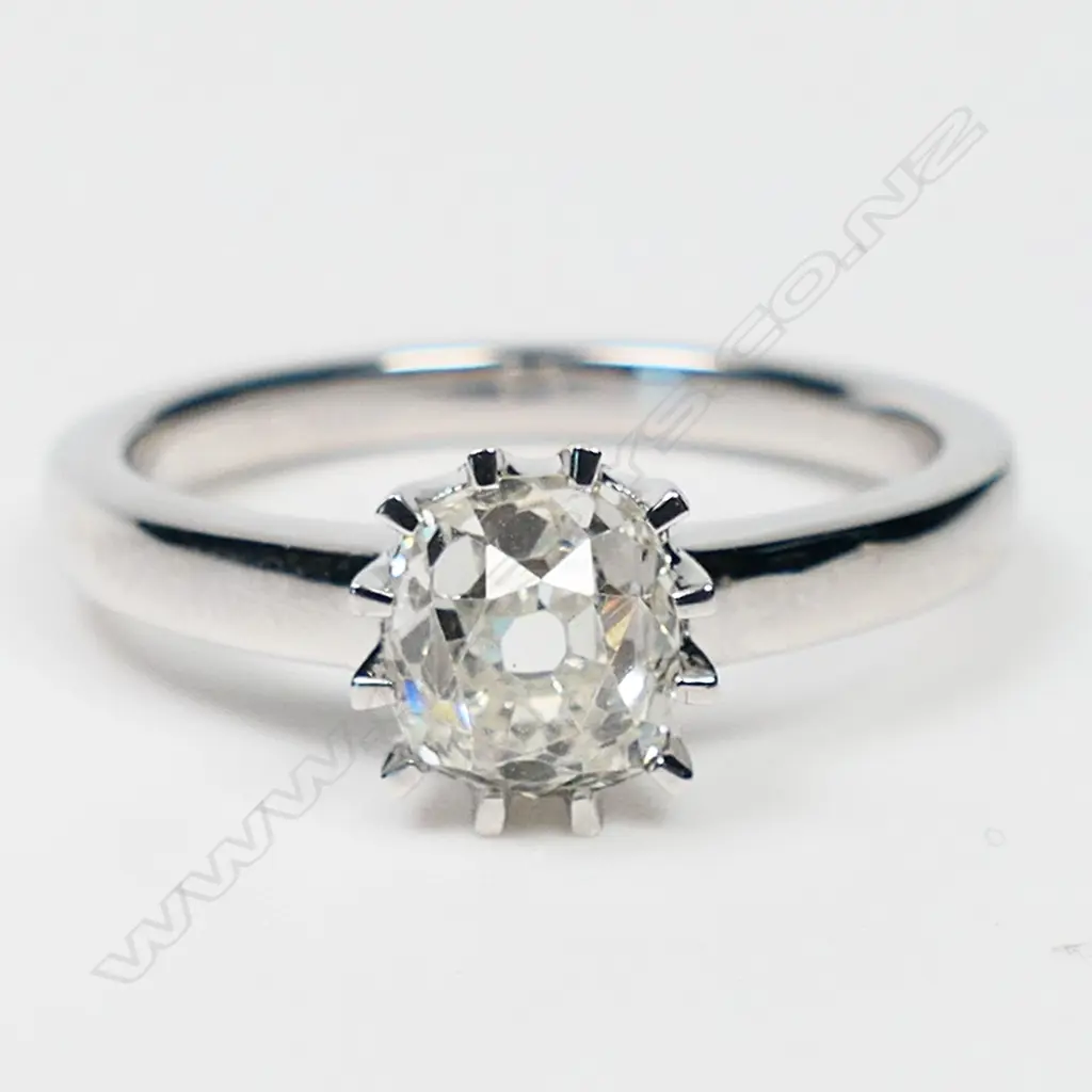 An 18ct white gold and diamond solitaire ring, Image 1++