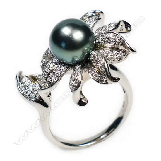 An 18ct white gold diamond and Tahitian pearl ring,
