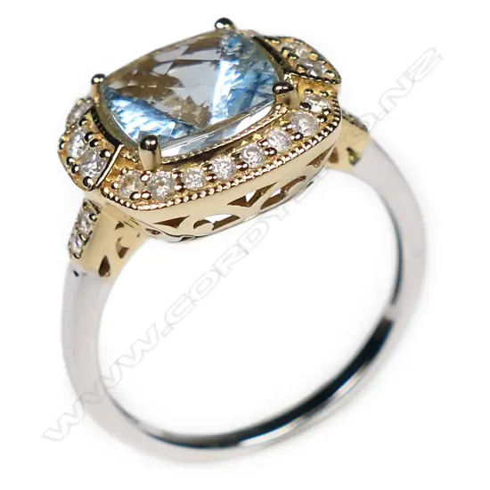 A 14ct yellow and white gold aquamarine and diamond vintage style ring,