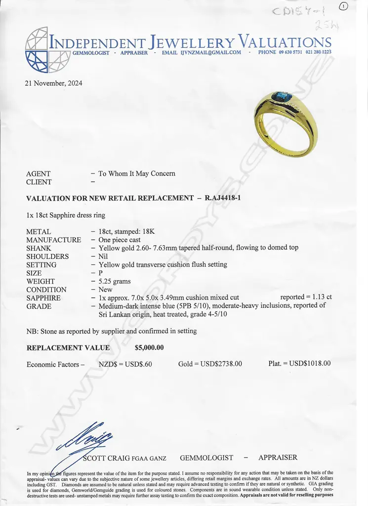 An 18ct gold and sapphire ring, Image 1++