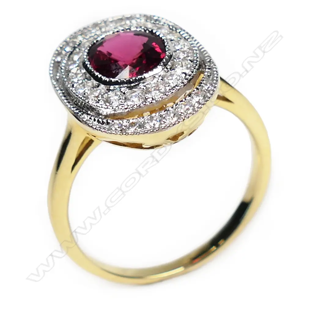 An 18ct gold diamond and rubellite ring, Image 1++