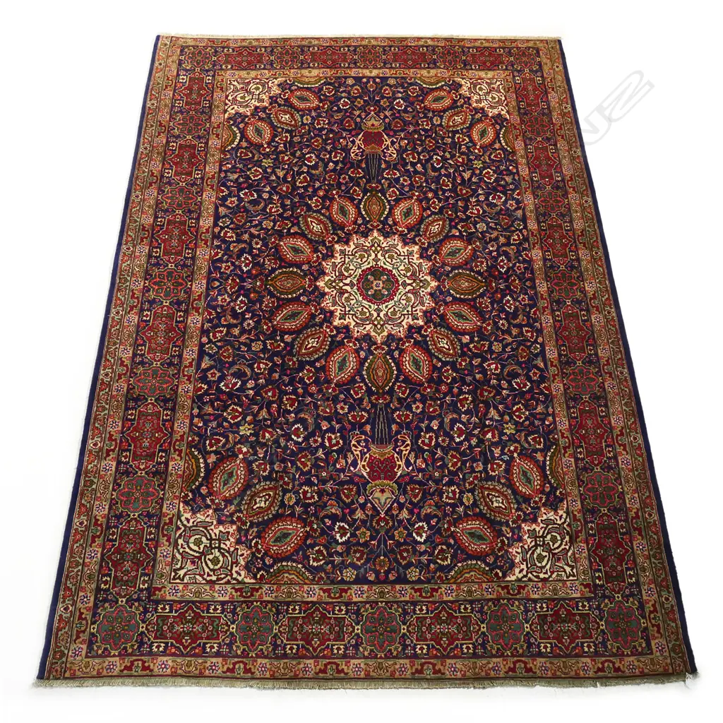 A Tabriz rug, Image 1++