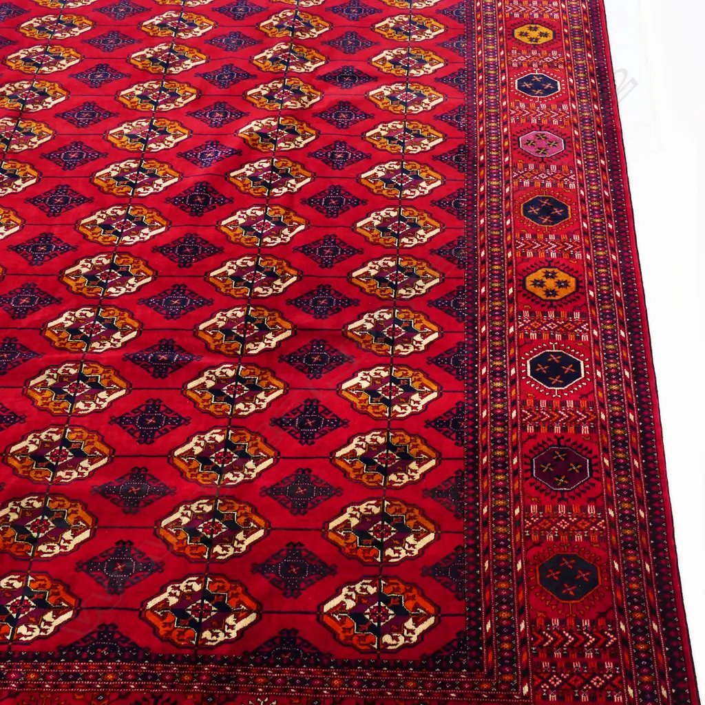 A fine old hand-knotted Persian Bukhara carpet, Image 1++