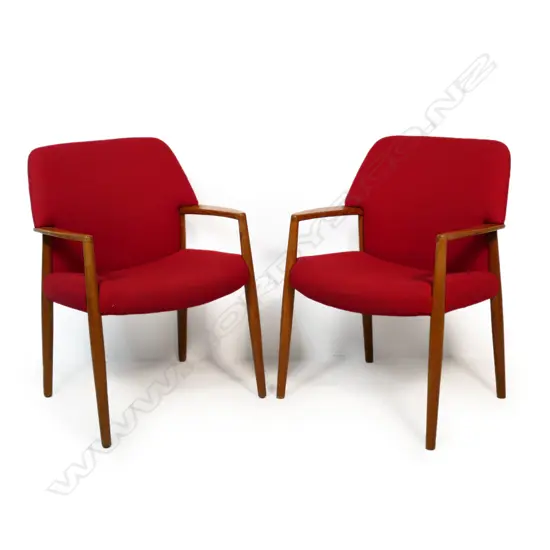 A pair of Danish modern oak framed mid-century designed armchairs,