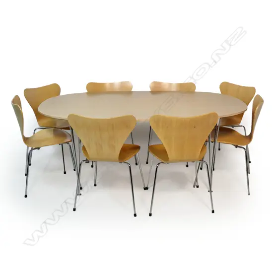A modern iconic Fritz Hansen table and eight chair suite,
