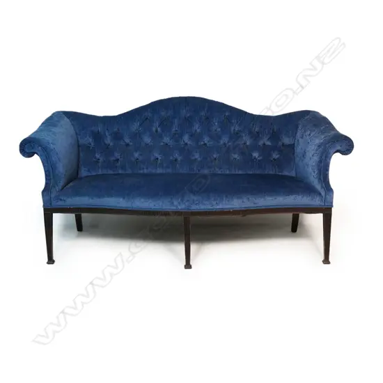 An early 20thC camel back sofa of fine proportions,