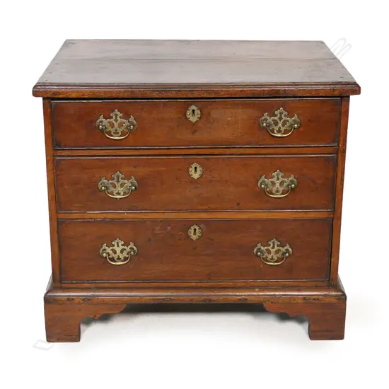 An oak George III small proportion chest of drawers,