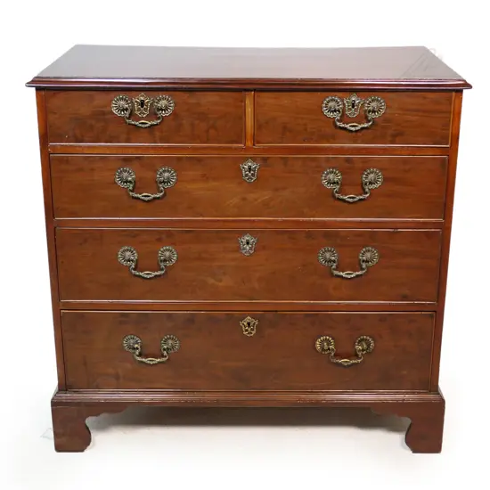 A classical George III mahogany small proportion flat front chest,