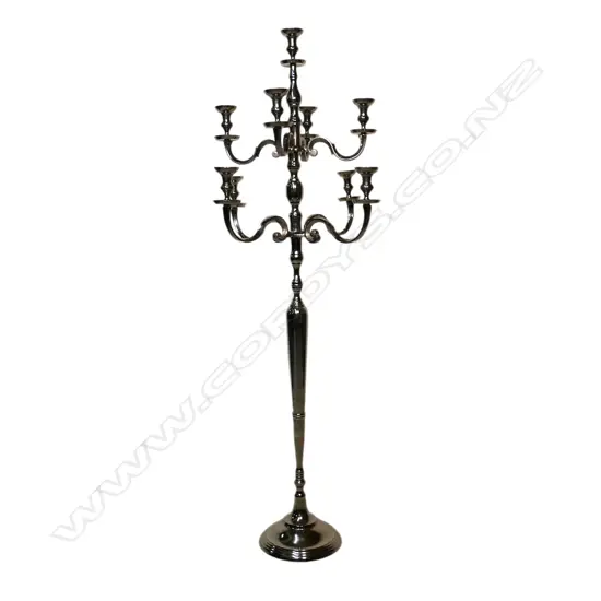 A modern nickel-plated aluminium floor standing nine light candelabra,