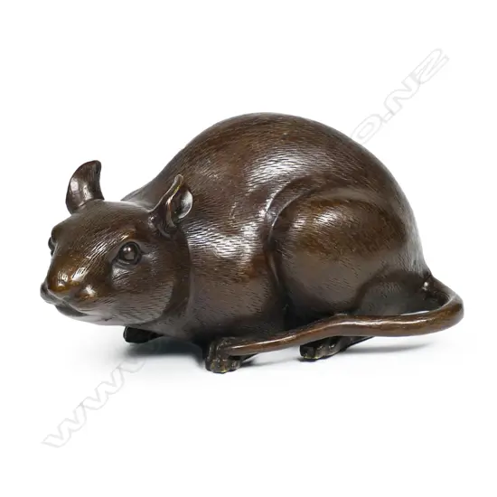 A bronze figure of a rat,