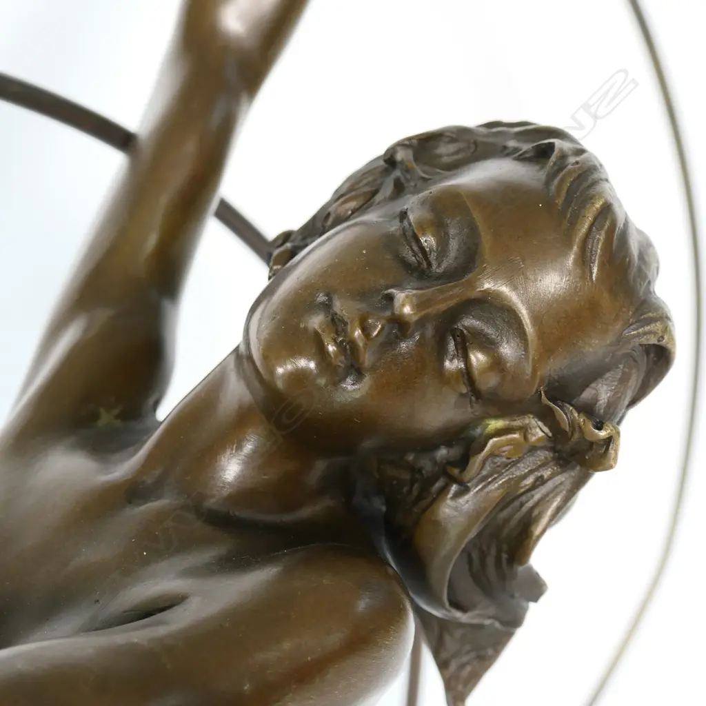 An Art Deco-style bronze 'Danseuse aux cerceaux' sculpture, Image 1++