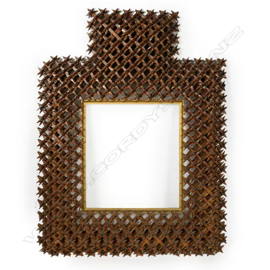 A large good 19thC handmade ‘Crown of Thorns’ tramp art picture frame,