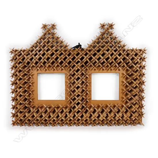 A c.1900 handmade ‘Crown of Thorns’ tramp art double picture frame,