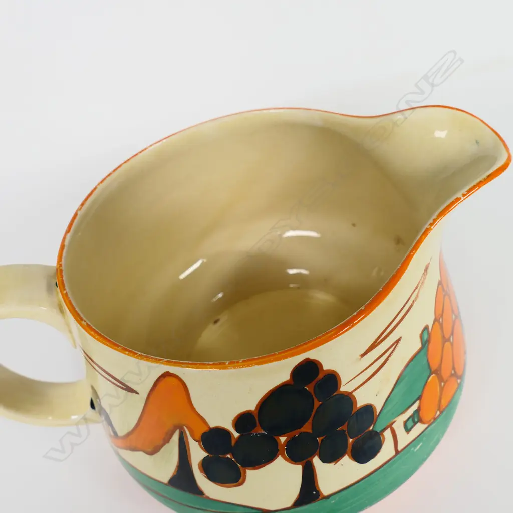 A Clarice Cliff Fantasque 'Tress and House' Crown shape jug, Image 1++