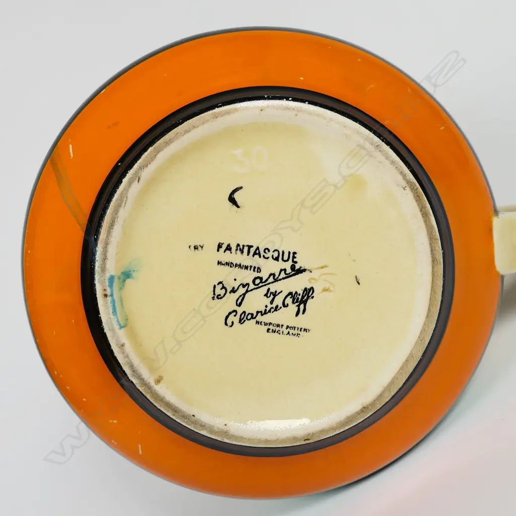 A Clarice Cliff Fantasque 'Tress and House' Crown shape jug, Image 1++