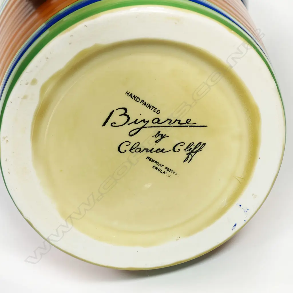 Clarice Cliff original Bizarre large Lotus jug - with a broad band of painted diamond design. Black printed marks to base. C.1929. Hairline crack to the top rim. H.290mm. Image 1++