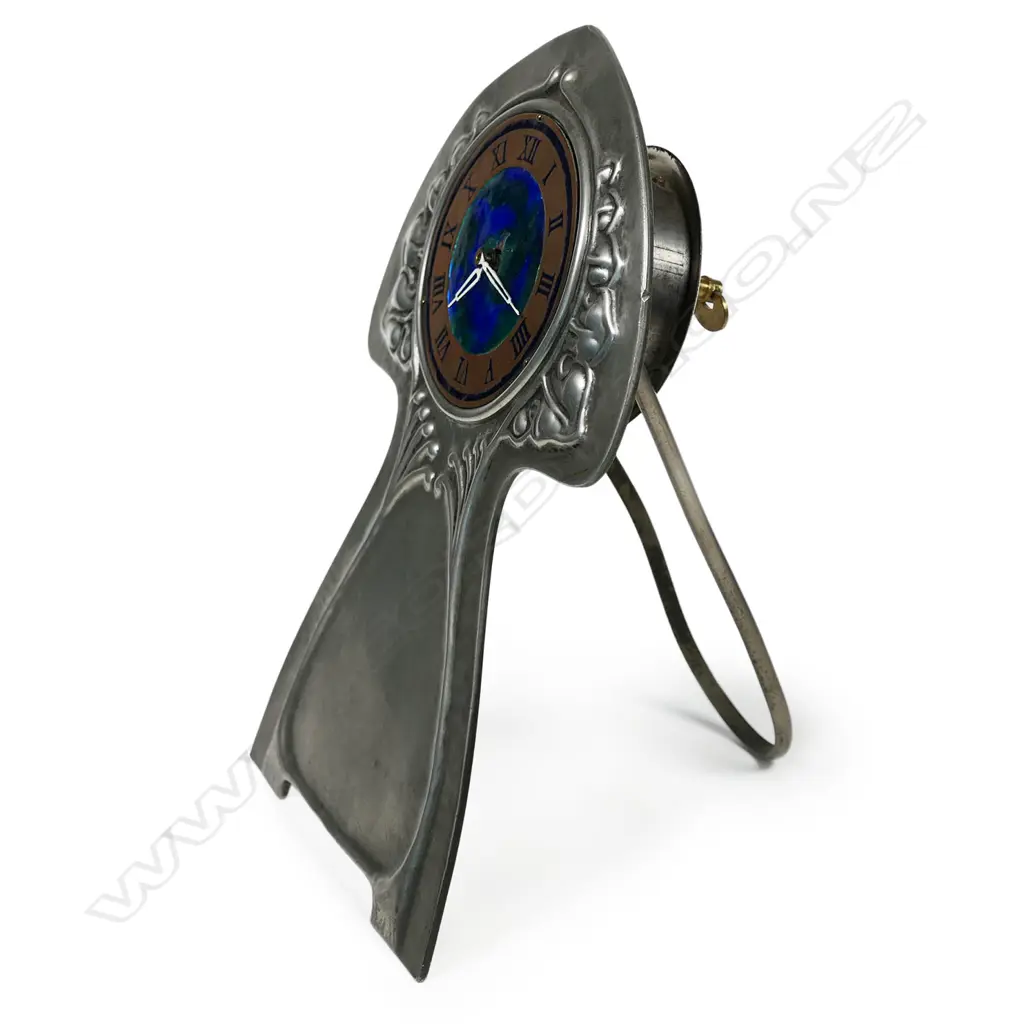 An 'English Pewter' (Tudric) pewter and enamel desk clock, Image 1++