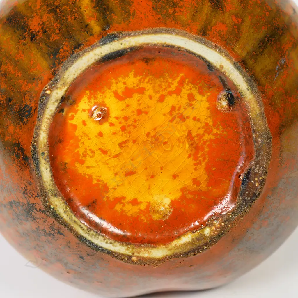 A Pilkington’s Royal Lancastrian vase with squat ovoid lobed base, orange glaze with mottled red and dark highlights, impressed mark. H.165mm. Image 1++