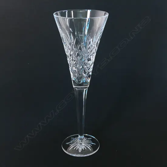 A set of six Waterford crystal toasting champagne flutes,