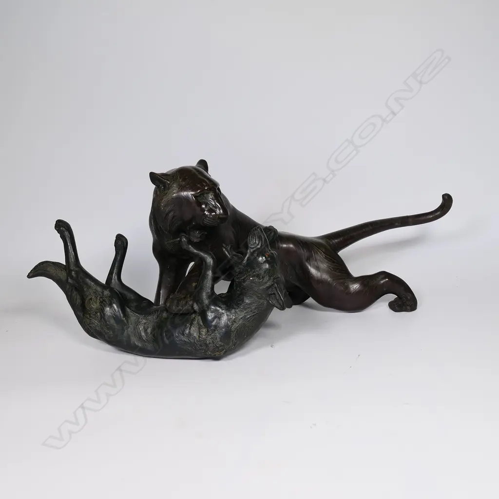 A large Japanese Meiji bronze figural group of a tiger being attacked by a wolf, Image 1++