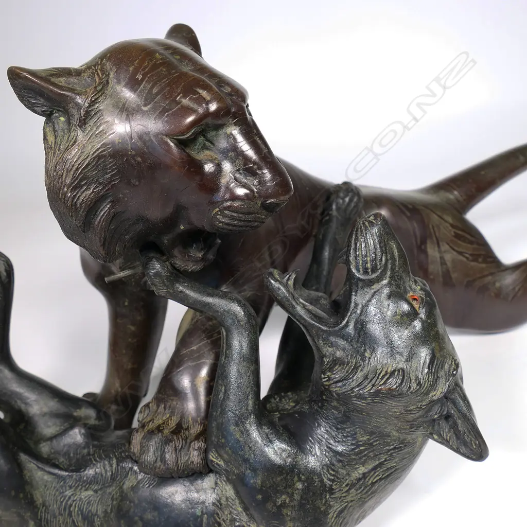 A large Japanese Meiji bronze figural group of a tiger being attacked by a wolf, Image 1++