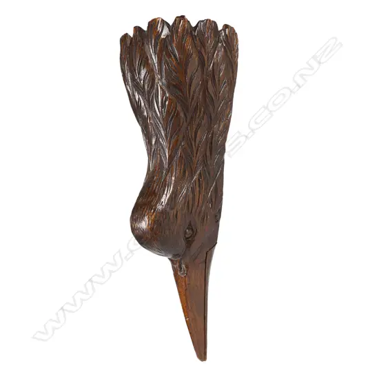 A c.1900 uncommon large carved letter clip as a kiwi's head and neck,