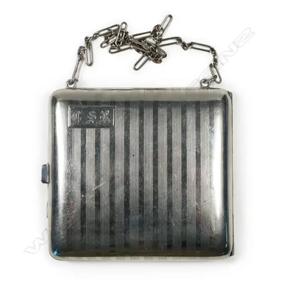 A quality Art Deco silver machine engraved ladies purse,