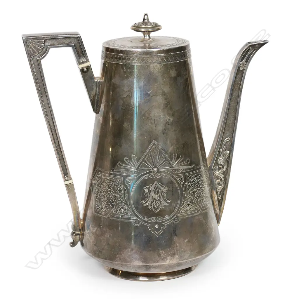 A Victorian Arts & Crafts silver coffee pot, Image 1++
