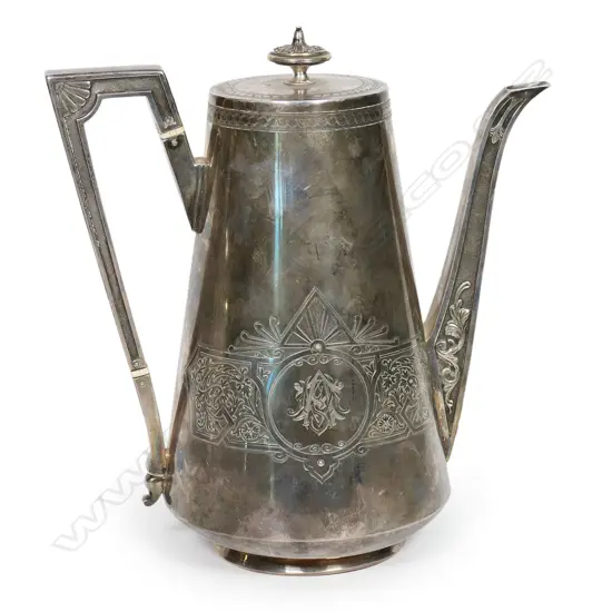 A Victorian Arts & Crafts silver coffee pot,