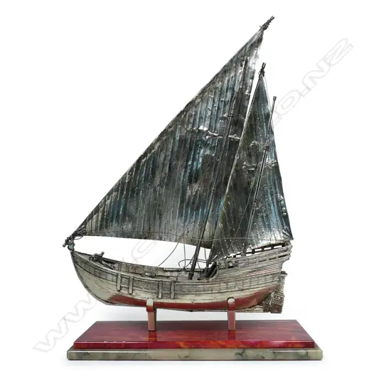 A vintage Italian silver model of a sail boat,
