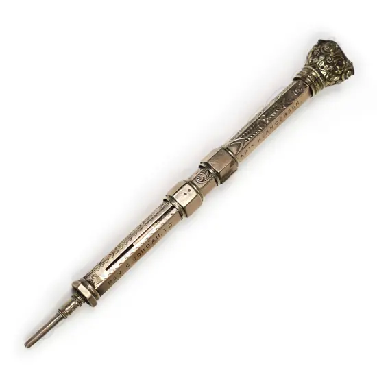 An Edwardian engraved 9ct gold and metal core propelling pen and pencil,