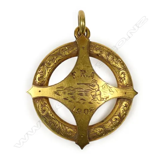 An early 20thC 15ct gold 'Challenge Shield' badge pendant,